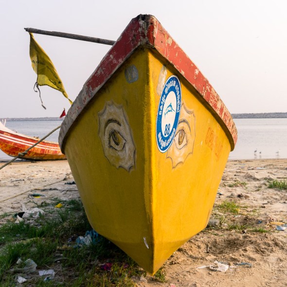 Picture of fishing boat on beach outside of fish market in Kollam, Kerala, India by mcmessner Mary Catherine Messner