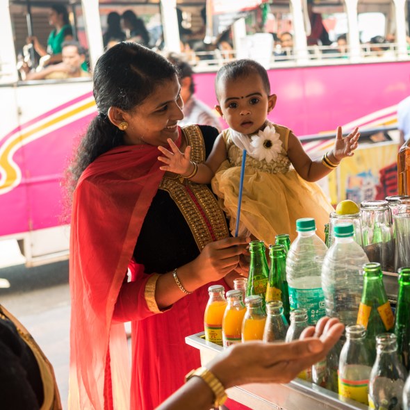 Street photography portrait of woman and baby in Thrissur, Kerala, India on workshop with Maciej Dakowicz by mcmessner Mary Catherine Messner