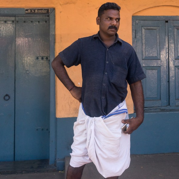 Street photography portrait of man in Thrissur, Kerala, India on workshop with Maciej Dakowicz by mcmessner Mary Catherine Messner
