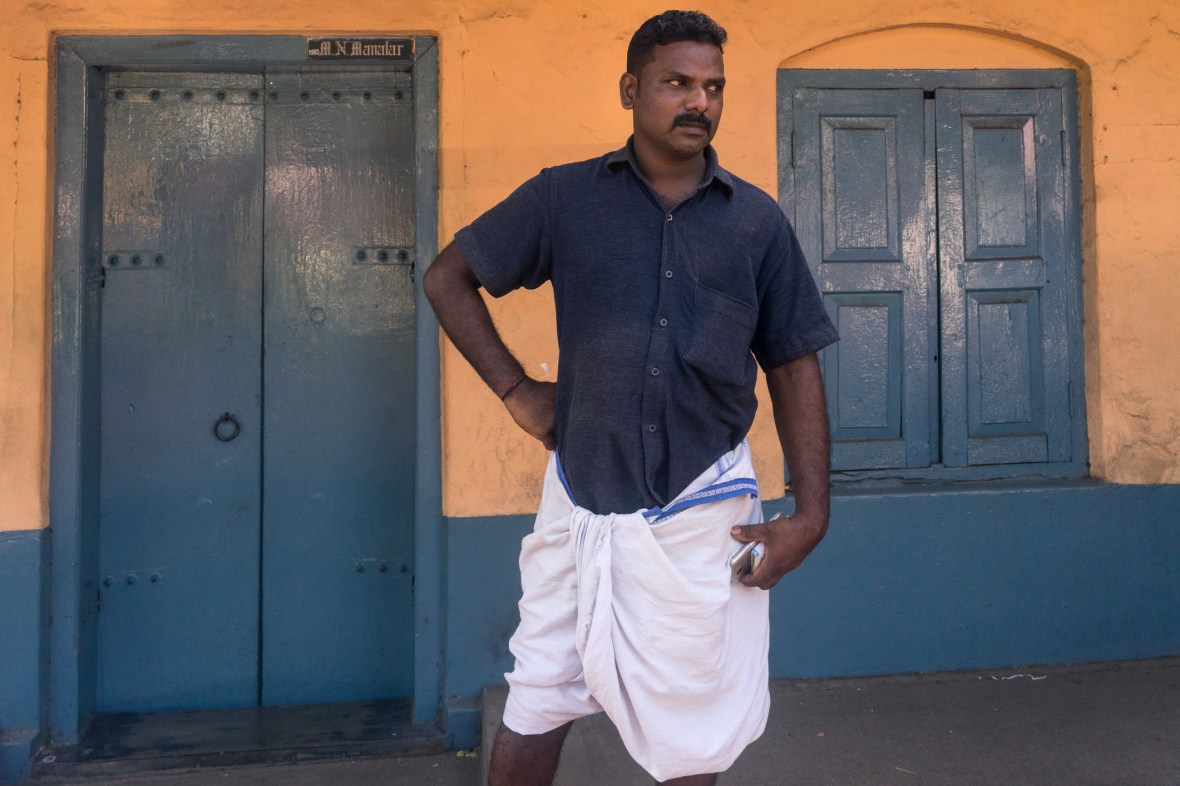 Street photography portrait of man in Thrissur, Kerala, India on workshop with Maciej Dakowicz by mcmessner Mary Catherine Messner