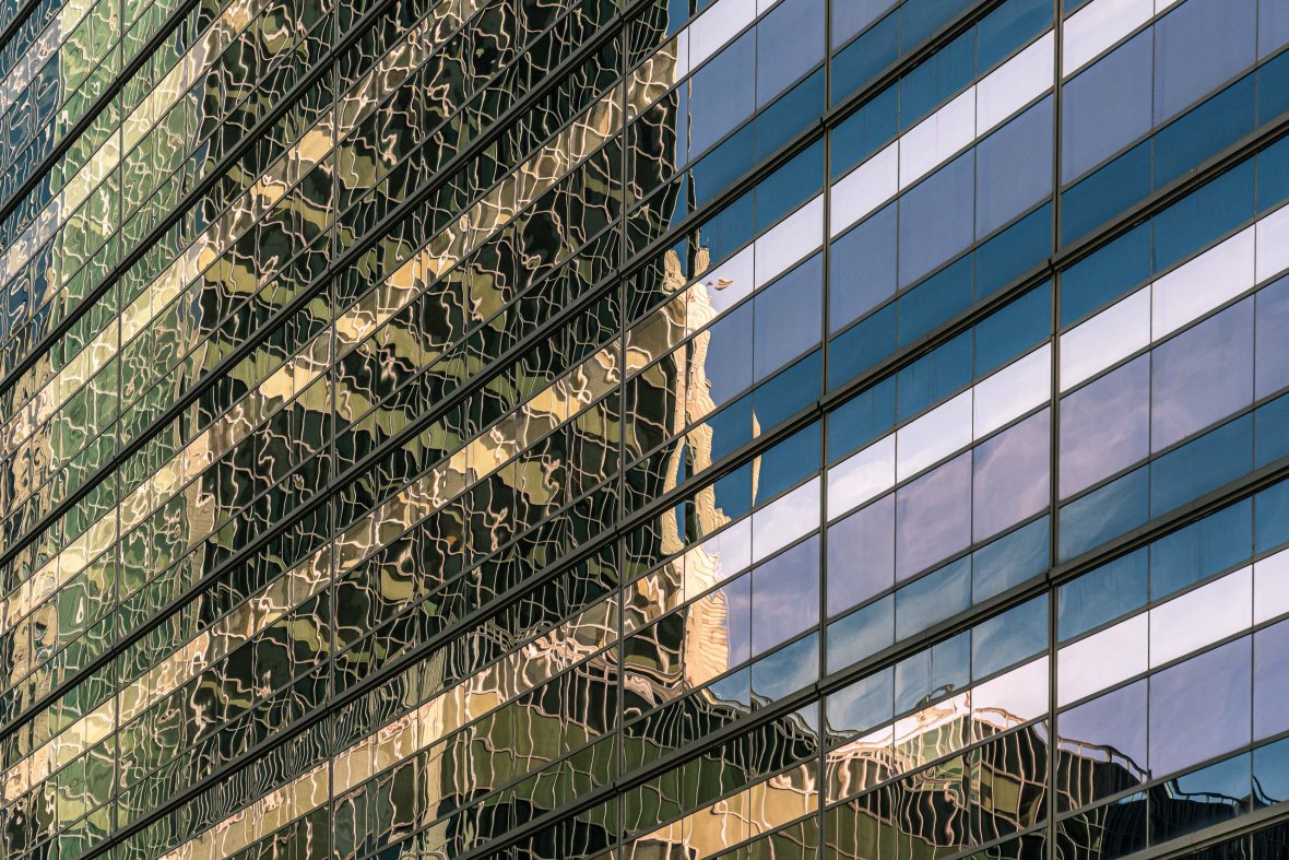 Travel and street photography of the architectural reflections found in New York City USA made by New York photographer Mary Catherine Messner (mcmessner).